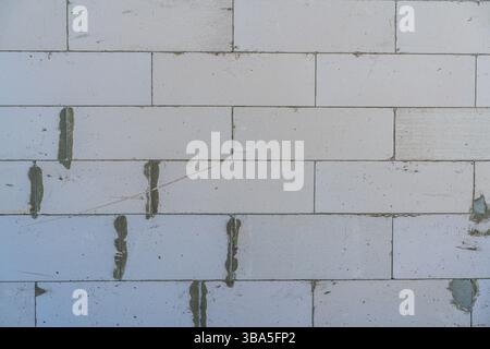 Background, aerated concrete block wall in full screen. Stock Photo
