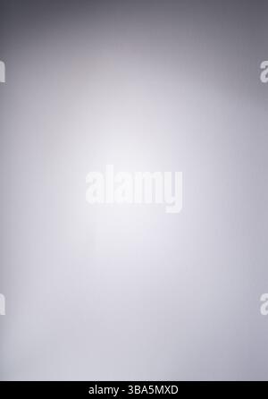 Vertical view of white textured printing paper. High-resolution white recording texture. Stock Photo