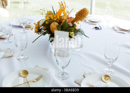 Tropical floral Wedding Table setting Stock Photo