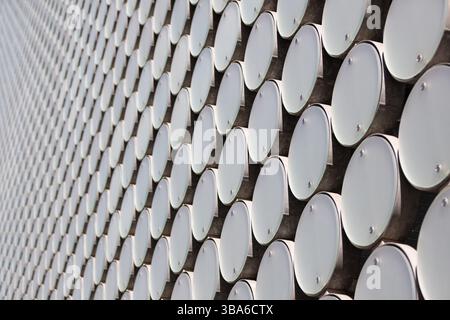 Repeating circles geometric pattern on a modern building exterior Stock Photo