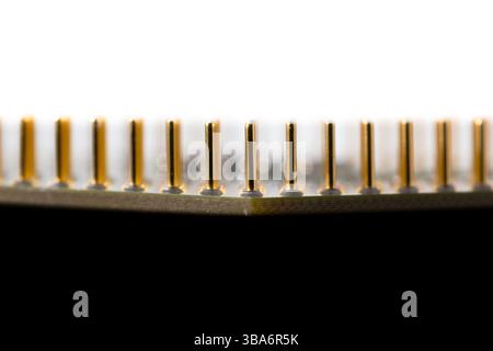Close-up image showcasing detailed components on a microchip, illustrating intricate electronic design principles and surface-level microengineering i Stock Photo