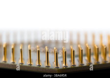 Close-up image showcasing detailed components on a microchip, illustrating intricate electronic design principles and surface-level microengineering i Stock Photo