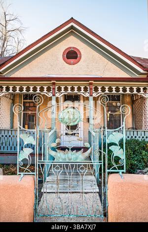 Images of ginkgo leaves at cast iron gate at residential house at 215 W Yankie Street, Silver City Historic District in Silver City, New Mexico, USA Stock Photo