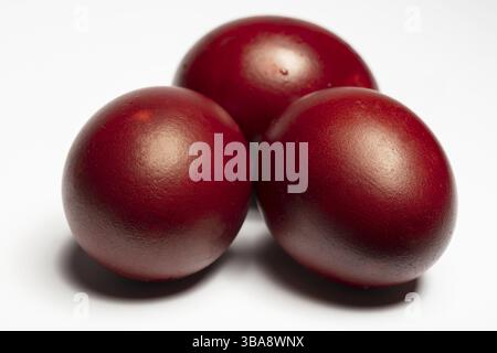 Classic Easter eggs painted with onion skins Close-up on a white background Stock Photo