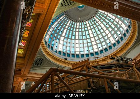 St Ann's Square, Manchester, UK - 11.16.2024: Interior view of a domed glass ceiling inside Royal Exchange Theatre, performing arts theatre Stock Photo