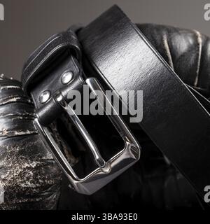 Part of a black crocodile leather belt. Expensive leather goods Stock Photo