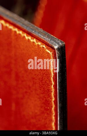 Part of a brown leather wallet or case with stitching Stock Photo