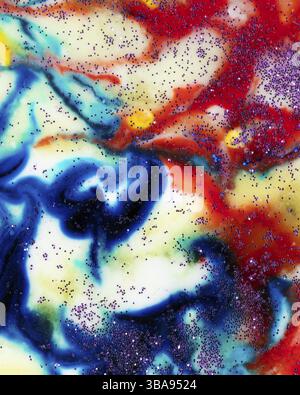 Very beautiful transparent art. An abstract work of art. Ink colours are amazingly bright, luminous, translucent, smooth. Blue and red stripes on a wh Stock Photo