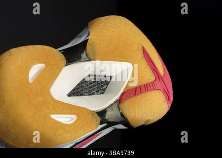 Polyurethane sole of sports shoes on a black background Stock Photo