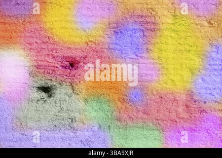 Multicoloured brick wall in close-up. Bright fun background in the style of graffiti Stock Photo
