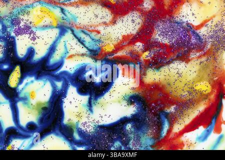 Very beautiful transparent art. An abstract work of art. Ink colours are amazingly bright, luminous, translucent, smooth. Blue and red stripes on a wh Stock Photo