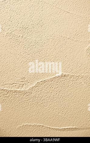 Front View of Light Beige Colored Grunge Concrete Wall Stock Photo