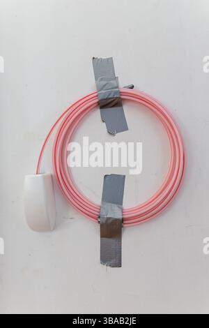 newly laid fiber optic house connection in the basement of an older residential building Stock Photo