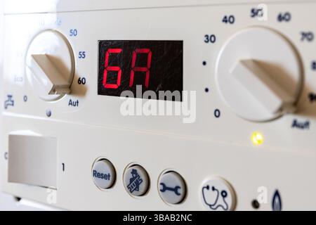 error code on the control unit of a condensing gas boiler Stock Photo