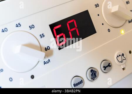 error code on the control unit of a condensing gas boiler Stock Photo