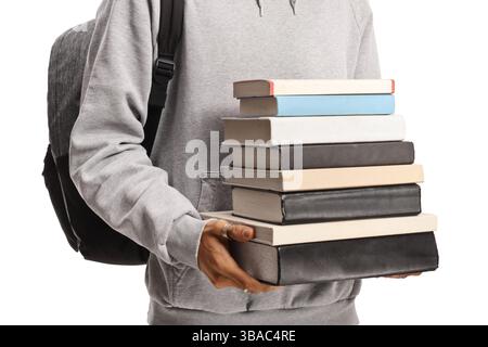 Student holding a pile of books isolated on white background Stock Photo