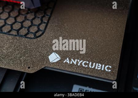 Jurmala, Latvia - 01.05.2025: Printing model with Anycubic 3D printer. 3D Printer Operating in a Workshop, Creating Intricate Designs With Precision Stock Photo