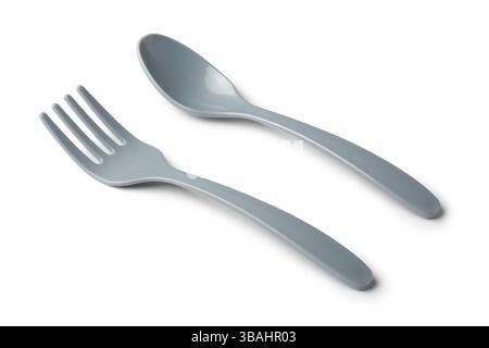 close-up of plastic fork and spoon isolated white background with shadows, used for eating food on the go like picnics, parties or fast food meals Stock Photo