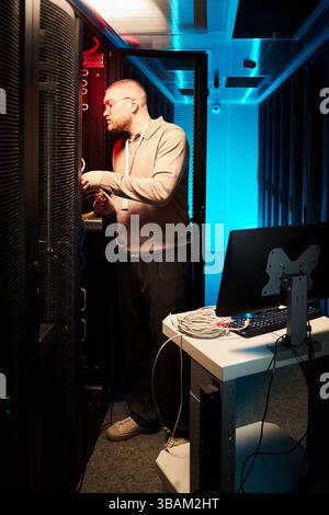 Managing IT Infrastructure in Data Center Stock Photo