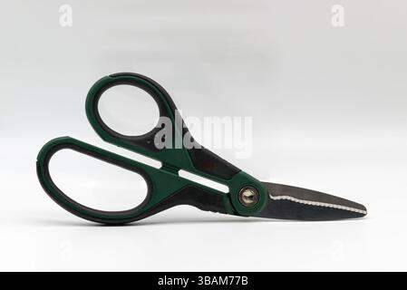 Multi purpose scissors isolated on white background. Stock Photo