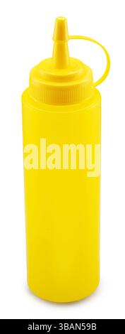 Yellow plastic dispenser bottle for mustard or other sauce isolated on white background. File contains clipping path. Stock Photo