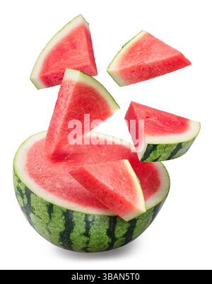Watermelon slices falling down over the half of watermelon isolated on white background. File contains clipping paths. Stock Photo
