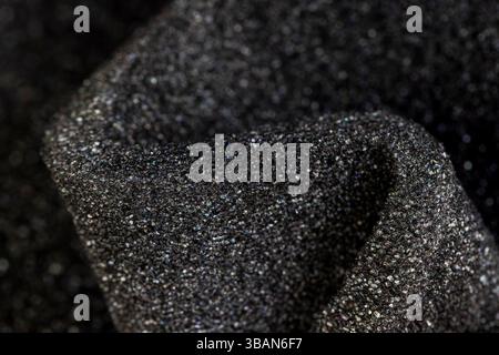 sponge for giving elasticity to objects or sound insulation or as a packaging material, close up Stock Photo