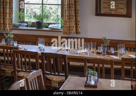 Empty beer glasses and receipts on pub tables, Bavaria, Germany, Europe Stock Photo