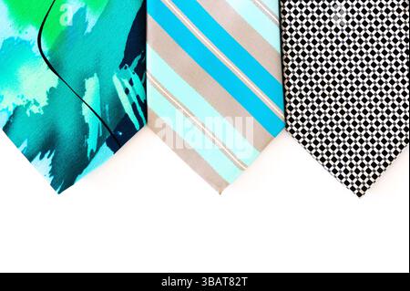 The tips of three ties on a white background Stock Photo