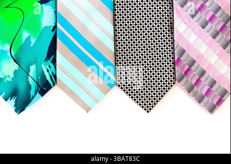 Four neckties lined up on a white background Stock Photo