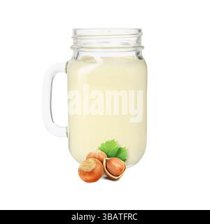 Nut milk in glass jar and hazelnuts isolated on white Stock Photo