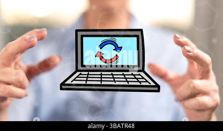 Upgrade concept between hands of a woman in background Stock Photo