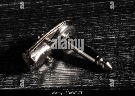 ts cable plug on black wood background Stock Photo