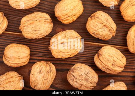 walnuts group on wood background top view Stock Photo
