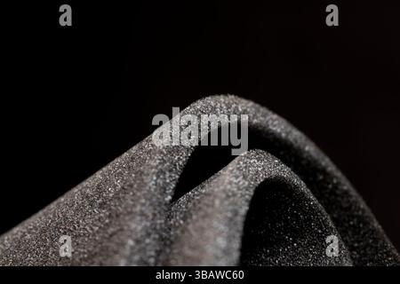 soft foam of black color for safe packaging of objects and products, foamy soft foam for giving elasticity to objects or sound insulation or as a pack Stock Photo