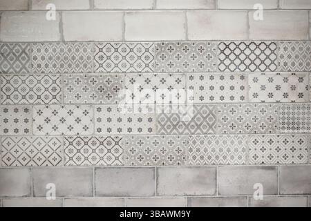 Ornate gray tile background with tiles of different color and patterns for interior design concept Stock Photo