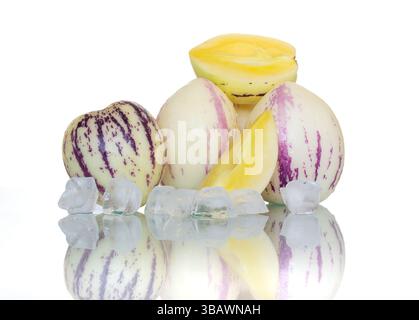 Exotic sweet cucumbers with ice on a white background Stock Photo