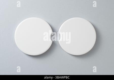 Two car cup holder coasters. Top view of ceramic coaters on isolated background. Blank coasters mockup Stock Photo