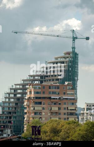 20.09.2024, Albania, Qark Tirana, Tirana - High-rise building under construction (office building, paused at the time of the photo) in the centre, a r Stock Photo