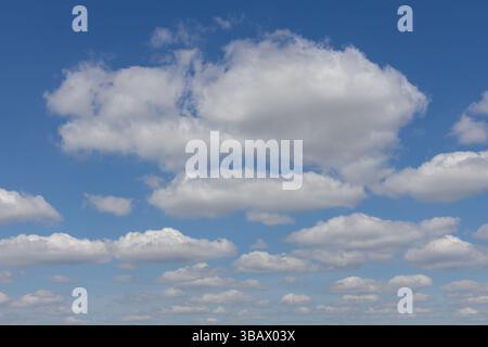 Blue Sky with Scattered White Clouds Stock Photo