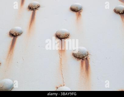 Riveted rusty metal texture background Stock Photo