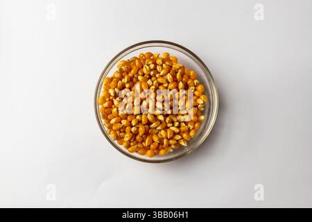 Raw popcorn - white background Stock Photo