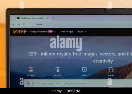 123RF stock photography website open in a laptop Stock Photo