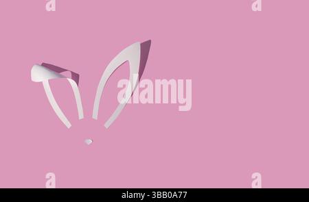 Rabbit ears from white paper on pink background. Easter minimal concept. Flat lay. Stock Photo