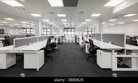 Spacious modern office with open-plan design and ergonomic furniture Stock Photo