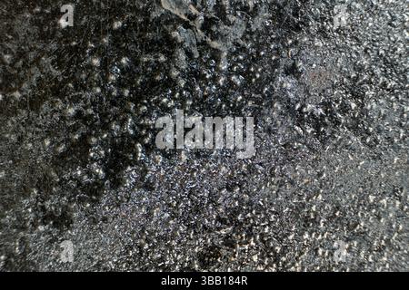 Rust stains on cast iron surface, macro Stock Photo