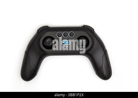 Black and white modern game controller with sticks isolated on studio ...