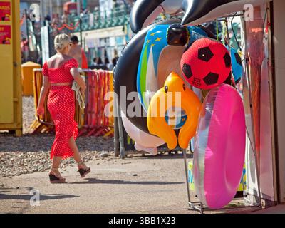 Seaside inflatables for sale close to Brighton beach Stock Photo - Alamy