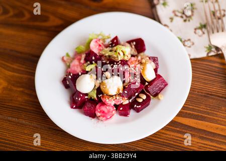 Healthy vegetable salad with cheese and boiled beets. Stock Photo