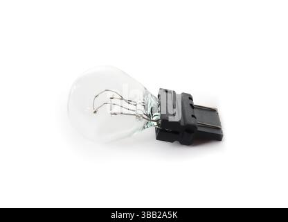 Turn signal light bulb for car. Miniature lightbulb. Burned out or damaged. Also known as turn signal bulb or indicator bulb for headlight. Selective Stock Photo